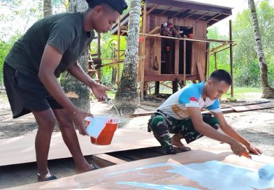 Satgas TMMD Kodim 1710/Mimika Lakukan Pengecatan Triplek Demi Hasil Maksimal