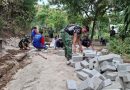 Sasaran Fisik TMMD 129 Kodim 0802 Ponorogo Sentuh Jalan Depan Vihara Vimalakirti