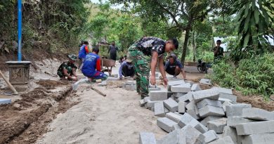 Sasaran Fisik TMMD 129 Kodim 0802 Ponorogo Sentuh Jalan Depan Vihara Vimalakirti