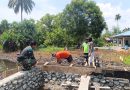 Medan Berlumpur Jadi Tantangan, Satgas TMMD Ke-130 Kerja Ekstra Rampungkan Pembangunan Jembatan